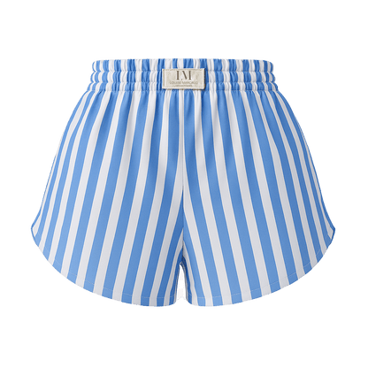 Détail du short BLOOM BLEU : élastique à la taille et griffe de marque, style sportif chic.